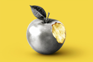An apple made to look like it is made of silver to demonstrate the health benefits of colloidal silver.