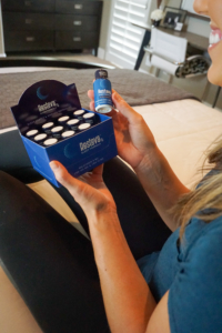 Woman uses Resteva Rx Sleep aid before bed for a better night's sleep