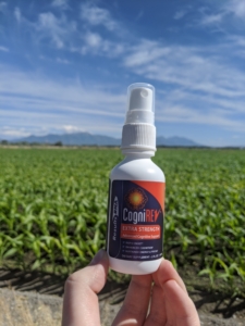 hand holds CogniREV energy and focus spray