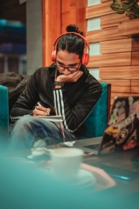 man listens to music to relieve his stress from work