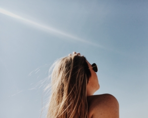 woman standing in sunlight for immune health